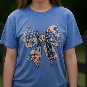 Comfort Colors Tee In Washed Denim With Girly Patriotic Red, White and Blue Bow.